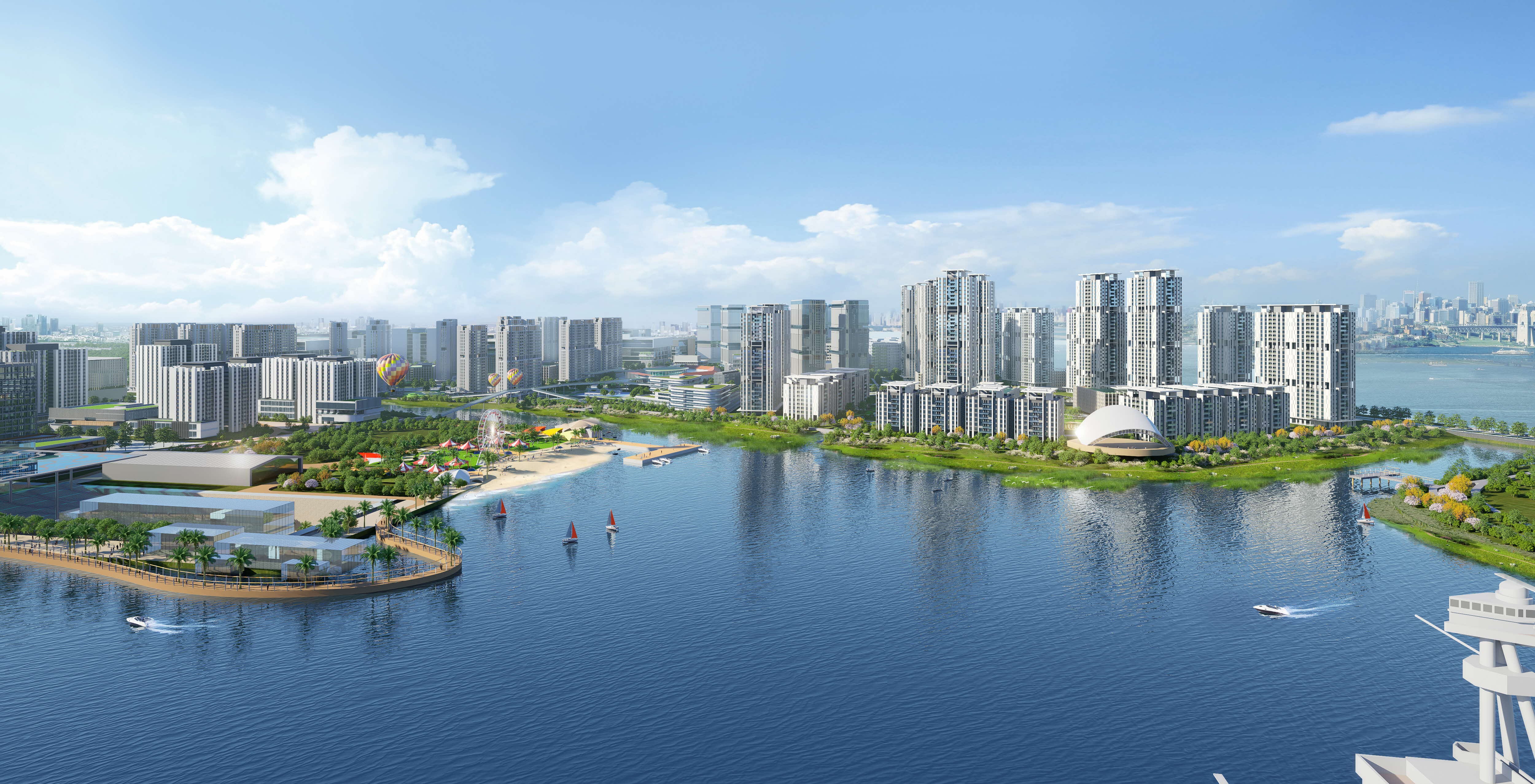 Aerial view of a modern city with high-rise buildings along a waterfront with a beach and amusement park.